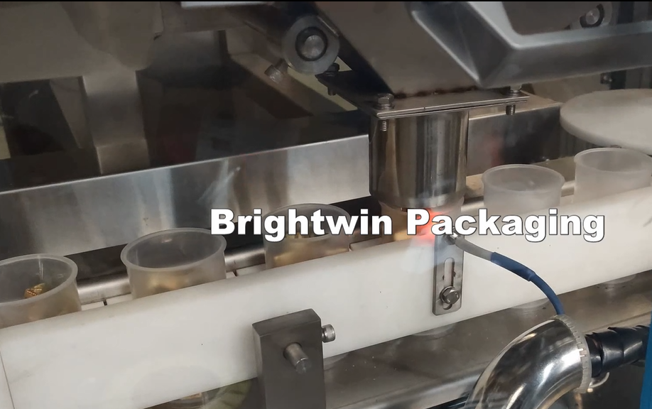https://www.brightwingroup2.com/chicken-cubes-counting-and-filling-cups-sealing-and-press-capping-machine-for-nestle-product/